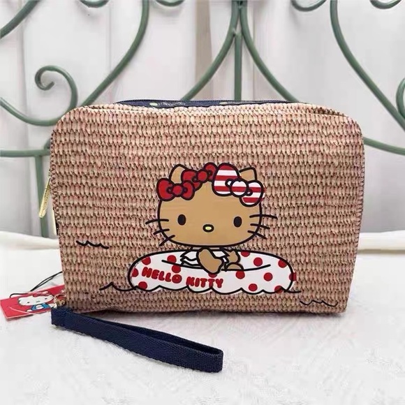 Lesportsac Handbags - Hello Kitty Le SportSac Tan Kitty cosmetics bag NEW Authentic